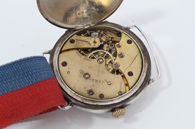 Lot 99 - First World War Officers Mappin ' Campaign' wristwatch with black and gilt dial , Swiss 15 jewel movement in circular silver case with engraved leopard head crest and monogram to the cuvet cover on...