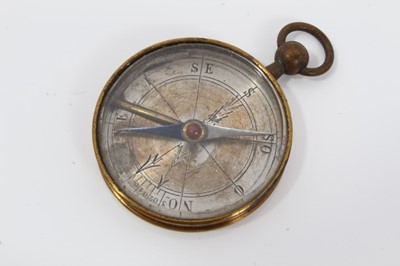Lot 101 - 19th century gilt brass pocket compass with engraved silver dial, 3.5cm diameter