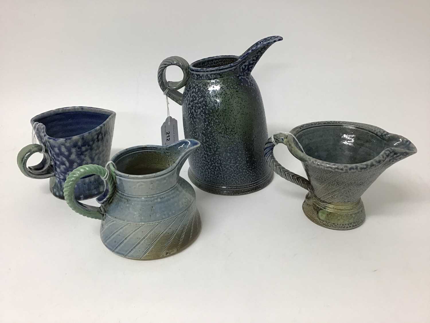 Lot 212 - Four Jane Hamlyn studio pottery salt glazed