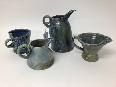 Lot 212 - Four Jane Hamlyn studio pottery salt glazed jugs, smallest 9.5cm high, tallest 19cm high