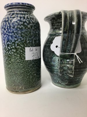 Lot 213 - Four pieces of Deborah Baynes studio pottery including lidded storage jar, 29cm high, two jugs, 19.5cm and 15cm high and a vase, 15.5cm high (all salt glazed)