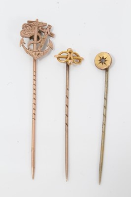 Lot 107 - Late Victorian 9ct gold anchor stickpin and two gold mounted stickpins (3)