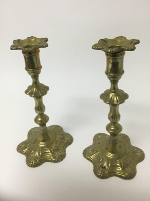 Lot 149 - Good pair of George II brass candlesticks