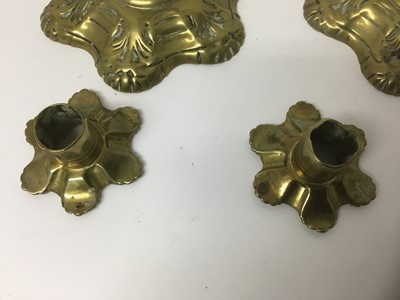 Lot 149 - Good pair of George II brass candlesticks