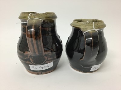 Lot 215 - Three Phil Rogers salt glazed studio pottery jugs, 18cm, 13.5cm and 12cm high (smaller two have monogram)