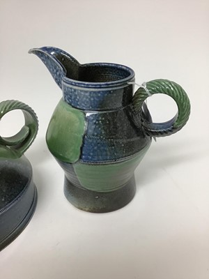 Lot 216 - Three Jane Hamlyn salt glazed studio pottery jugs, 17cm, 15cm and 13cm high plus a Jane Hamlyn teapot, all with monogram