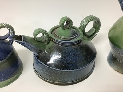 Lot 216 - Three Jane Hamlyn salt glazed studio pottery jugs, 17cm, 15cm and 13cm high plus a Jane Hamlyn teapot, all with monogram