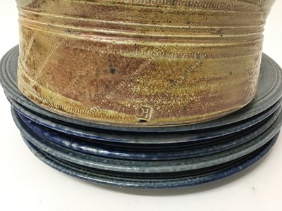Lot 187 - Five Jane Hamlyn blue salt glazed studio pottery plates, 27.5cm diameter and a beige casserole dish with lid