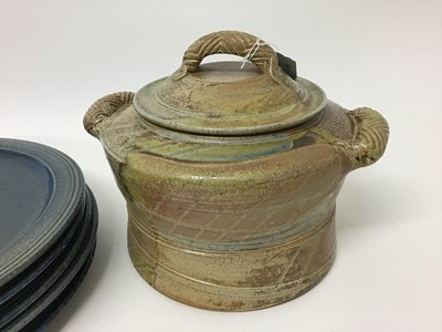 Lot 219 - Five Jane Hamlyn blue salt glazed studio pottery plates, 27.5cm diameter and a beige casserole dish with lid