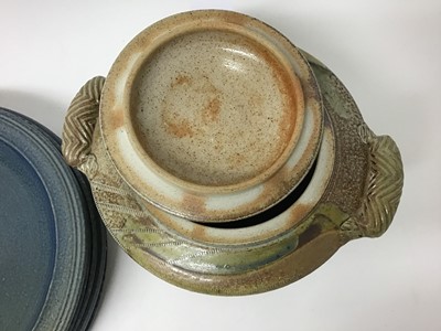 Lot 219 - Five Jane Hamlyn blue salt glazed studio pottery plates, 27.5cm diameter and a beige casserole dish with lid