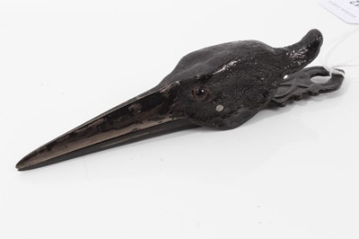 Lot 112 - Edwardian novelty paper clip in the form of a black painted crows head with glass eyes 15 cm