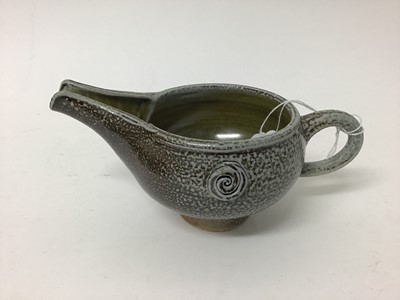 Lot 222 - Five salt glazed studio pottery items including Mark Compton jug, 11cm high, two Jane Hamlyn mugs, both 9cm high, another 7.5cm high and Mike Todd jug, 7cm high