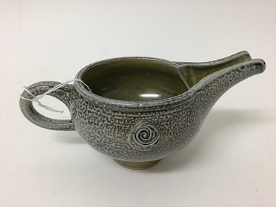 Lot 222 - Five salt glazed studio pottery items including Mark Compton jug, 11cm high, two Jane Hamlyn mugs, both 9cm high, another 7.5cm high and Mike Todd jug, 7cm high