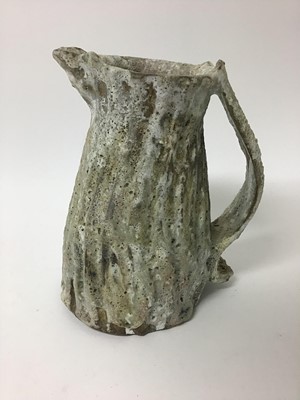 Lot 223 - Two Aki Moriuchi textured jugs, 21cm and 10cm high