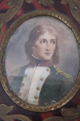 Lot 116 - Napoleon Bonaparte - print of the young Napoleon in uniform in ornate boule work oval frame  9 x 7 cm