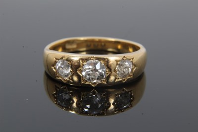 Lot 36 - Victorian diamond three stone gypsy ring with three old cut diamonds in star shape gypsy setting on plain tapered shank. Estimated total diamond weight approximately 0.75cts.