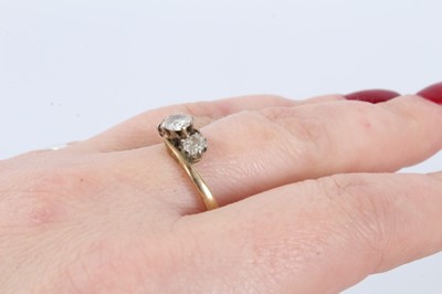 Lot 37 - Diamond three stone ring with three old cut diamonds in cross-over claw setting on 9ct gold shank. Estimated total diamond weight approximately 0.65cts. Ring size O½