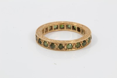 Lot 38 - Five gold and gem-set dress rings, two with synthetic white stones in 9ct gold setting, green cabochon cluster ring in 14ct gold setting, green stone eternity ring an d a 9ct gold cameo ring