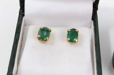 Lot 46 - Nine pairs of gold earrings to include a pair of emerald single stone stud earrings in 18ct gold setting, two pairs of peridot earrings and six other pairs of gem-set earrings in 9ct gold setting