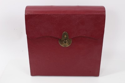 Lot 123 - Good quality Victorian red Morocco leather travelling writing case of book-shaped form with fold out writing slope, pen, ink,  stationary and correspondence compartments .30.5 cm high and wide, 8cm...
