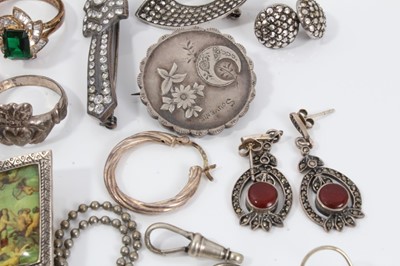 Lot 52 - Collection of silver and white metal jewellery to include a silver amethyst and marcasite panel bracelet, silver and marcasite rings and brooches, and similar jewellery