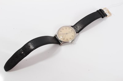 Lot 140 - 1950s Gentleman's Omega wristwatch in stainless steel case with silvered dial , luminous Arabic numerals with subsidiary seconds on leather strap, the case 37mm.
