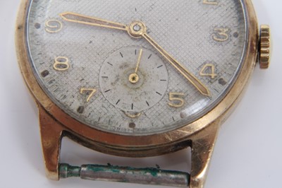 Lot 142 - 1950s Gentleman's Tudor wristwatch in 9ct gold case with matted silvered dial with gilt Arabic numerals and subsidiary seconds , the case 32mm.