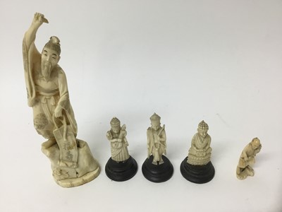 Lot 292 - Two late 19th / early 20th century Japanese carved ivory figure, together with three Indian ivory deity figures