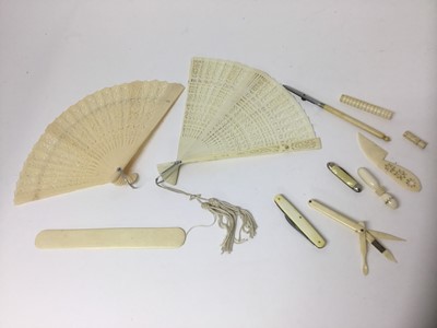 Lot 295 - Two carved ivory fans, various other ivory and bone works of art