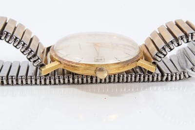 Lot 145 - 1960s Gentleman's Hamilton calendar wristwatch in yellow metal case - probably 18ct with silvered dial on expanding bracelet.The case 34mm