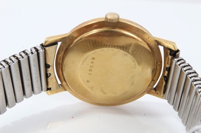 Lot 145 - 1960s Gentleman's Hamilton calendar wristwatch in yellow metal case - probably 18ct with silvered dial on expanding bracelet.The case 34mm