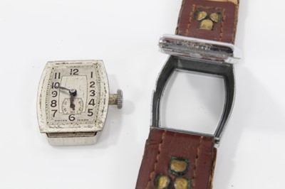 Lot 136 - Art Deco mid-size wristwatch with tonneau shape dial in chromium plated case on leather strap