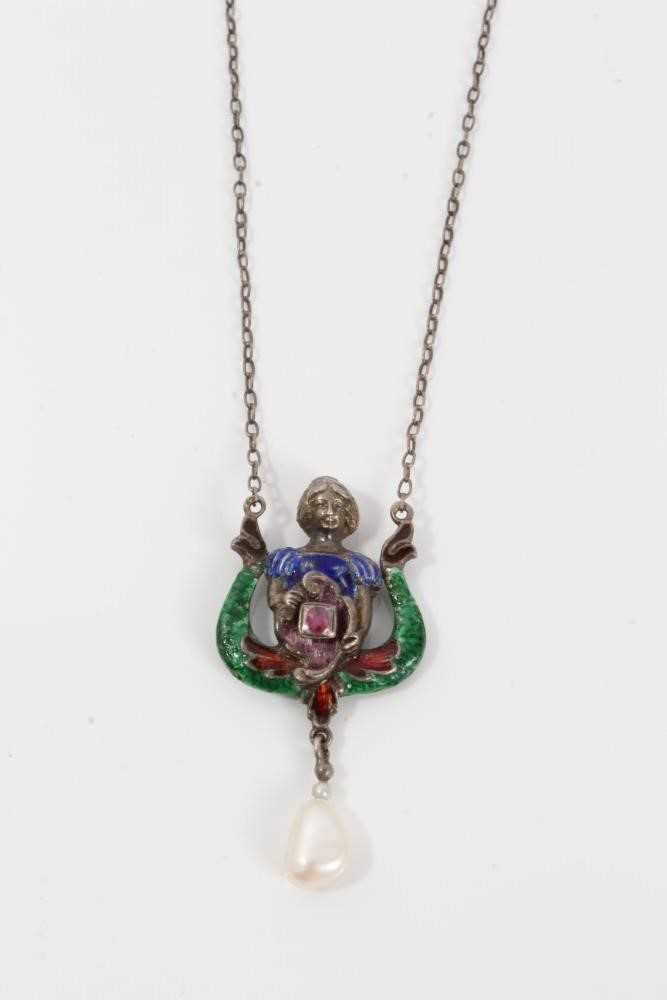 Lot 137 - 19th century Austro Hungarian Renaissancerevival silver enamel and and gem-sent pendant necklace with female bust holding a ruby and suspending a baroque cultured pearl.