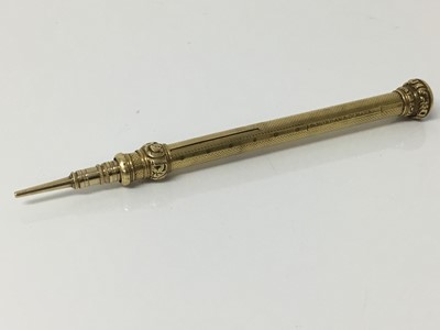 Lot 308 - Antique yellow metal Sampson Mordan propelling pencil, the detachable top with inset bloodstone panel, engine turned and foliate borders, stamped 'S. Morden & Co. maker', 11.5cm long extended