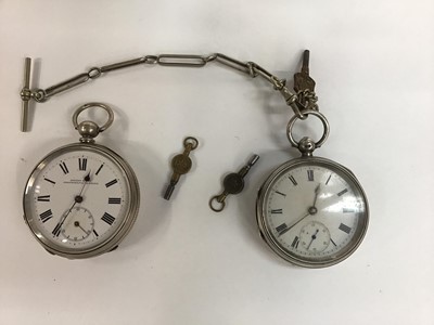 Lot 152 - Two late Victorian silver open face key wind pocket watches , one with silver chain and two keys