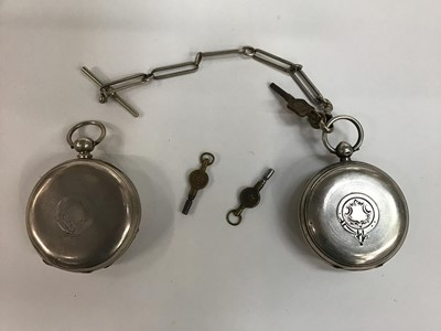 Lot 152 - Two late Victorian silver open face key wind pocket watches , one with silver chain and two keys