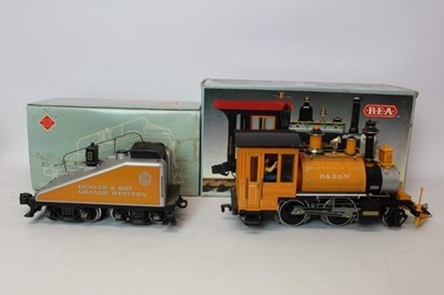 Lot 1438 - Railway Express Agency Rogers 2-4-2 Steam Locomotive 21002 and Tender Car REA 21902, both boxed.