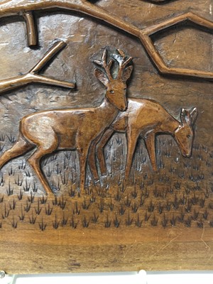 Lot 326 - Max Maier, 20th century German School, carved wooden panel depicting deer in woodland, inscribed verso, 25cm x 23cm