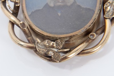 Lot 287 - Victorian gilt metal revolving memorial pendant