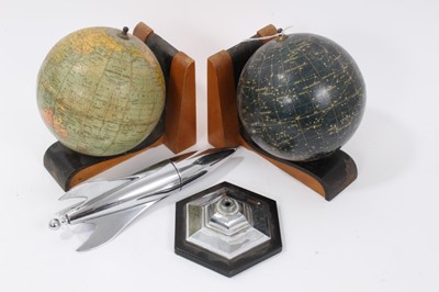 Lot 354 - Pair 1950s Philips terrestrial and celestial globe bookends on ebonised walnut stands 17 cm long and 1950s chrome plated rocket table lighter (3)