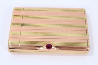 Lot 2 - Fine Imperial Russian Faberge two colour striped gold cigarette case of retangular form with concealed vesta case to one end with striking plate to the interior of the lid, cabochon ruby thumb piec...