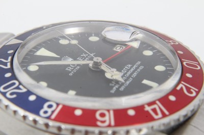 Lot 1 - Rare 1960s gentlemen's Rolex Oyster Perpetual GMT-Master stainless steel wristwatch, model 1675, serial number 1798453, circa 1965-1966, the matte black dial with luminous hour markers and date ape...