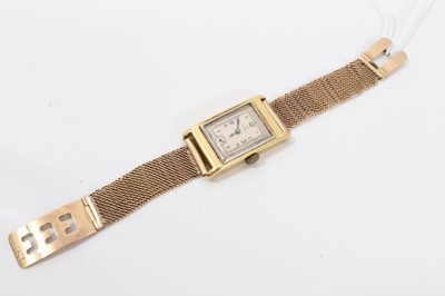 Lot 264 - 1930s gentlemans 18ct gold Omega  retangular wristwatch with silvered dial on 9ct gold mesh bracelet strap