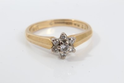 Lot 247 - Diamond cluster ring with a flower head cluster of seven brilliant cut diamonds in claw setting on 18ct yellow gold shank, ring size M½-N.
