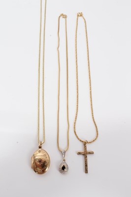 Lot 279 - Three 9ct gold necklaces with 9 ct gold crucifix, locket and blue stone pendant - 22.5 grams