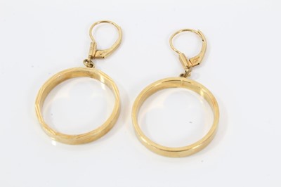 Lot 527 - Three pairs 9ct gold hoop earrings, 8.7 grams