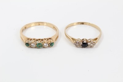 Lot 314 - Ladies 9ct diamond and emerald dress ring and another with sapphire and diamonds (2)