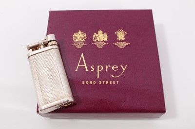 Lot 305 - Vintage Dunhill silver plated pocket lighter with engine turned decoration, 7cm high, in Asprey card box