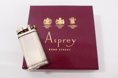 Lot 306 - Vintage Dunhill silver plated pocket lighter with engine turned decoration, 6.5cm high, in Asprey card box