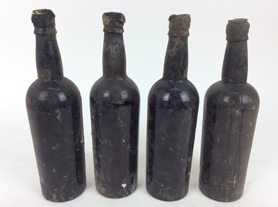 Lot 112 - Port - four bottles, lacking labels but just visible are the seals of Corney & Barrow, the earliest bottle 1927, the others indistinct w